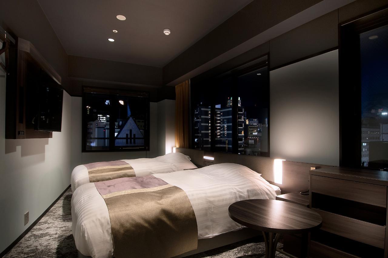 Kobe Plaza Hotel West Bagian luar foto